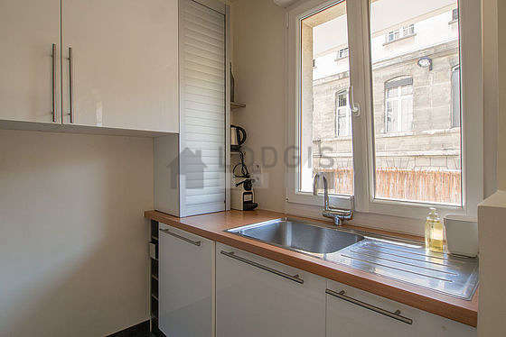Very bright kitchen with double-glazed windows and balcony