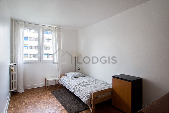 Bedroom with double-glazed windows facing the road