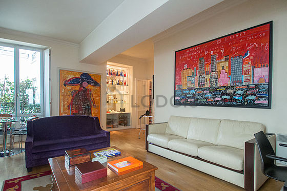 Living room with double-glazed windows facing the road