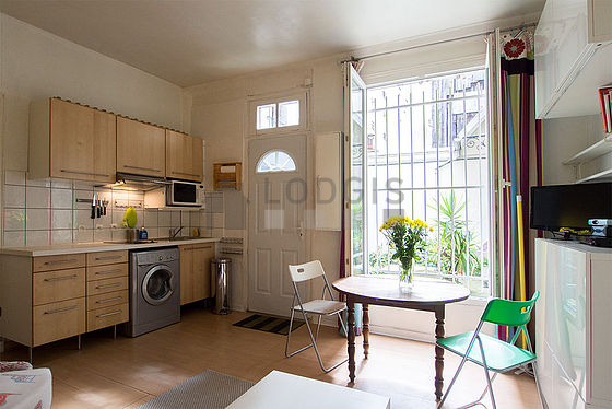 Living room with double-glazed windows facing the courtyard