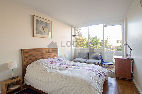 Bedroom with wooden floor