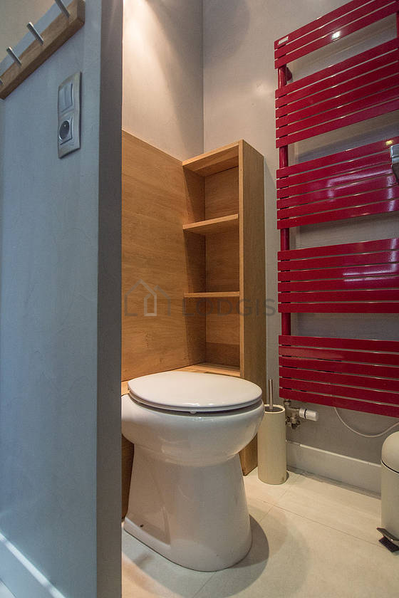 Pleasant and bright bathroom with tile floor