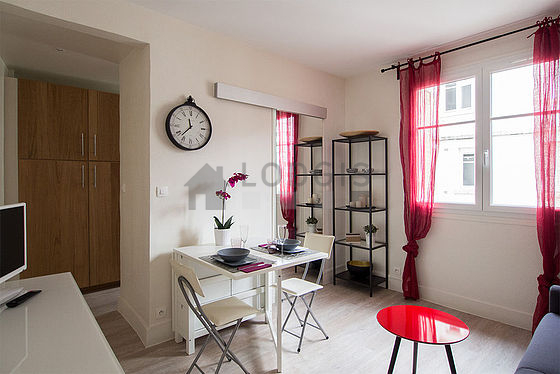 Quiet living room furnished with 1 sofabed(s) of 140cm, tv, hi-fi stereo, wardrobe