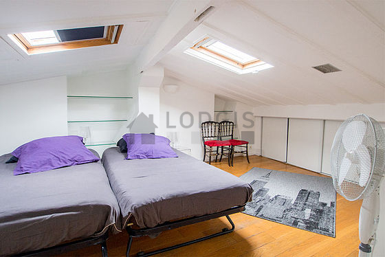 Bedroom with wooden floor