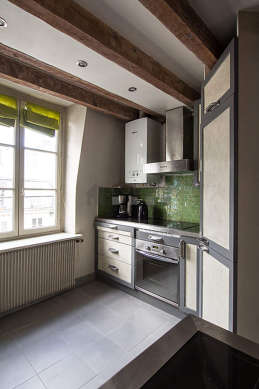 Kitchen with double-glazed windows facing the road