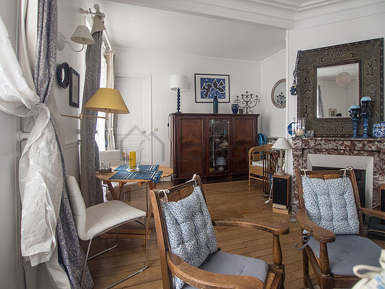 Living room with double-glazed windows facing the courtyard