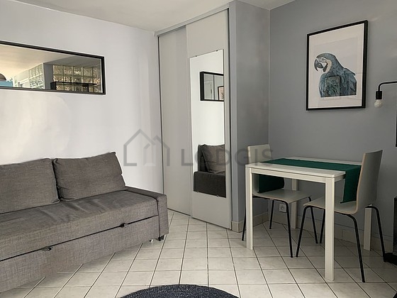 Living room with tile floor
