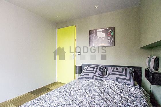 Bedroom with double-glazed windows facing the road