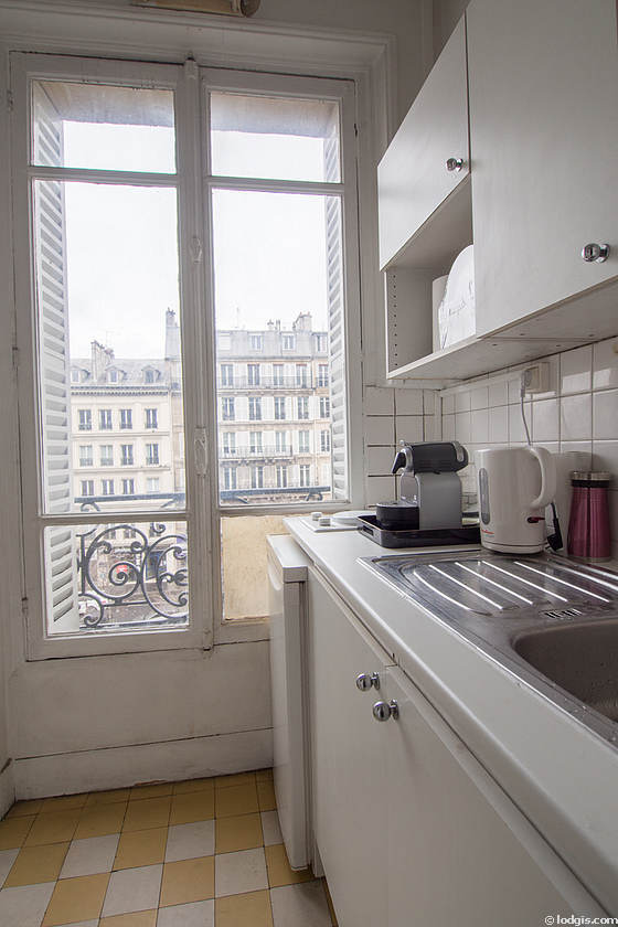 Very bright kitchen with double-glazed windows facing the road