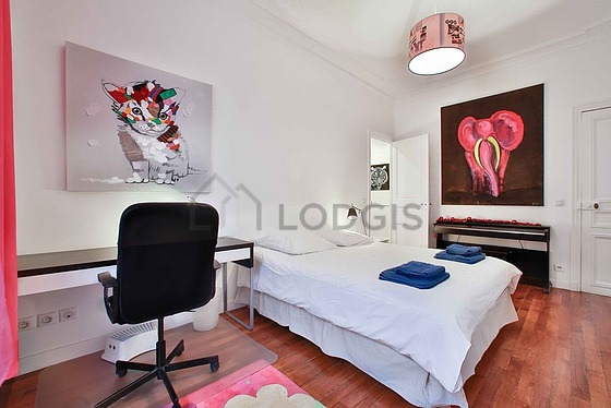 Bedroom with double-glazed windows facing the road