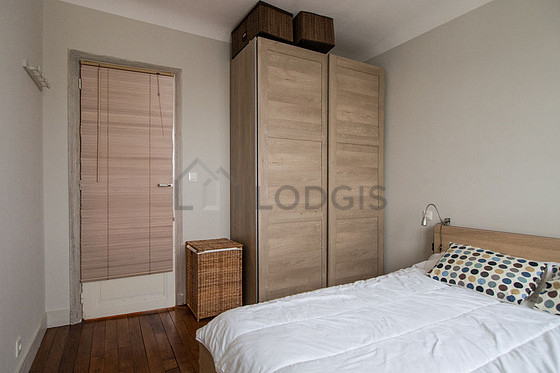 Bedroom with wooden floor