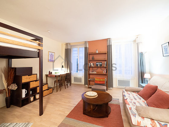 Quiet living room furnished with 1 sofabed(s) of 140cm, 1 loft bed(s) of 140cm, tv, cupboard