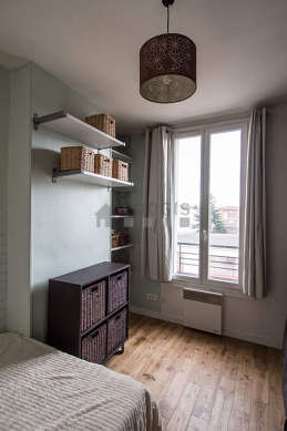 Bedroom with double-glazed windows facing the road