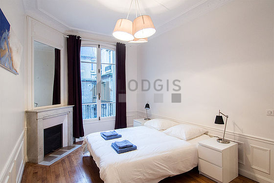 Bedroom with wooden floor