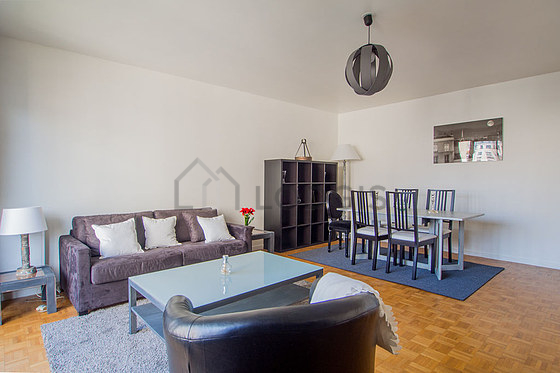 Living room with double-glazed windows and balcony facing the garden