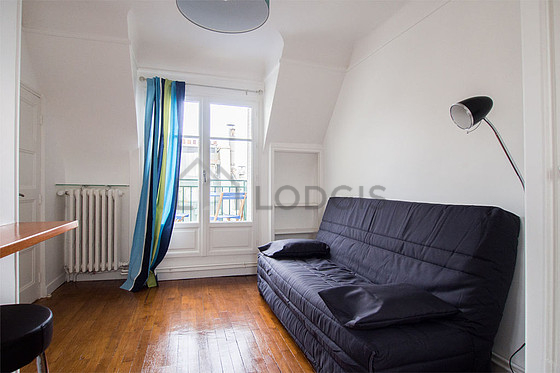 Very quiet living room furnished with 1 sofabed(s) of 140cm, tv, wardrobe, cupboard