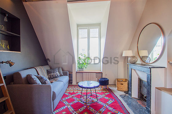 Quiet living room furnished with 1 loft bed(s) of 90cm, 1 sofabed(s) of 140cm, tv, wardrobe
