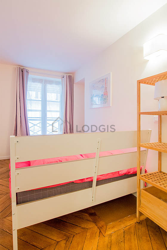 Bedroom with double-glazed windows facing the road