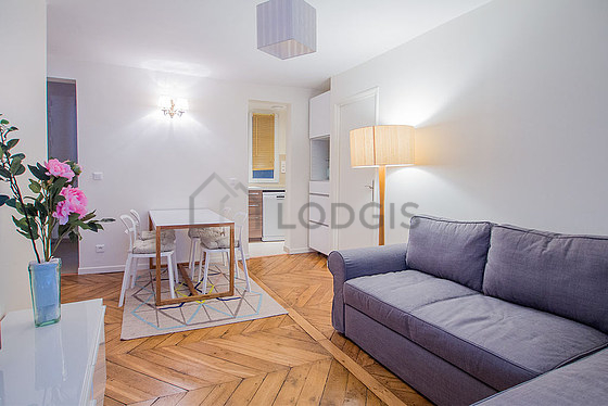 Living room with double-glazed windows facing the road