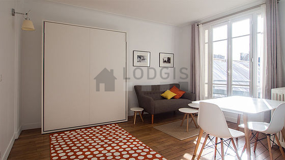 Living room with double-glazed windows facing the courtyard