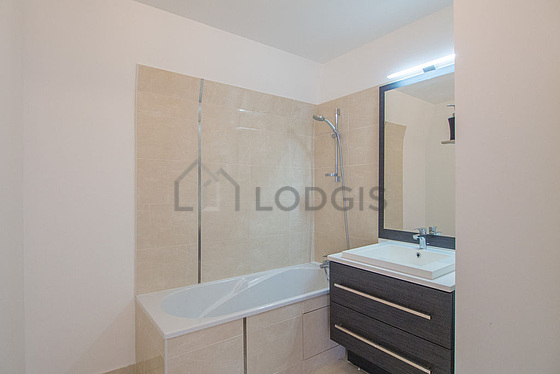 Beautiful and bright bathroom with tile floor