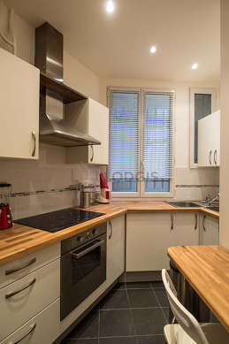 Kitchen where you can have dinner for 2 person(s) equipped with washing machine, dryer, refrigerator, freezer