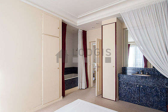Bright bedroom equipped with wardrobe, cupboard, 1 chair(s)