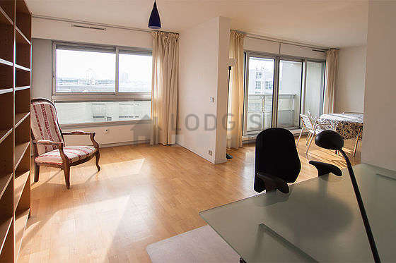 Beautiful office with woodenfloor furnished with desk, bookcase, 3 chair(s)