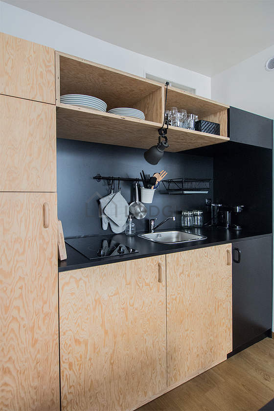 Kitchen equipped with washing machine, dryer, refrigerator, freezer