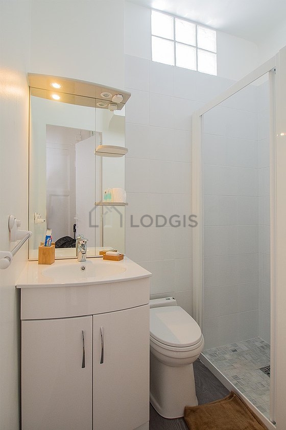 Pleasant and bright bathroom with tile floor