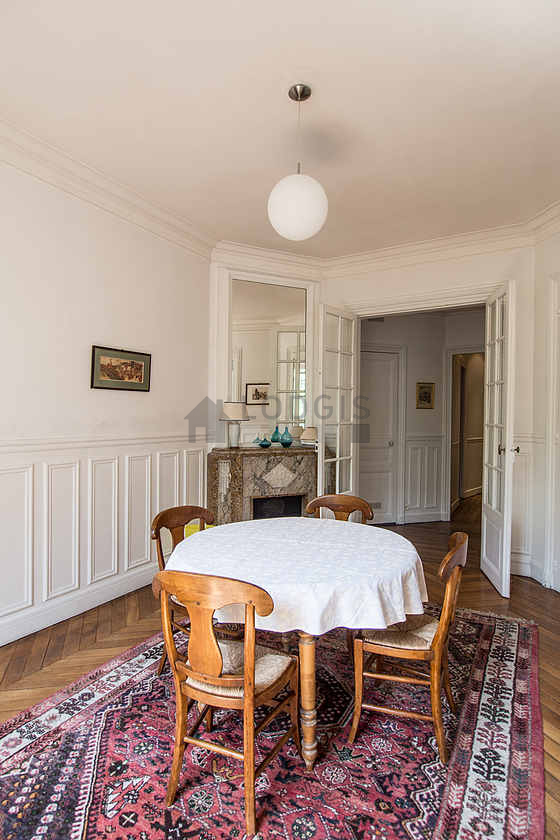 Dining room equipped with dining table, cupboard