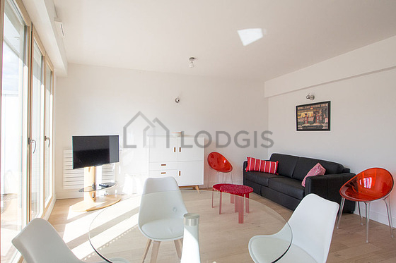 Quiet living room furnished with 1 sofabed(s) of 140cm, dining table, coffee table, 4 chair(s)