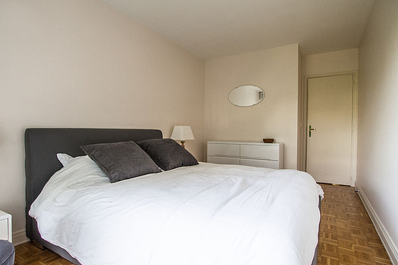 Bedroom with windows facing the garden
