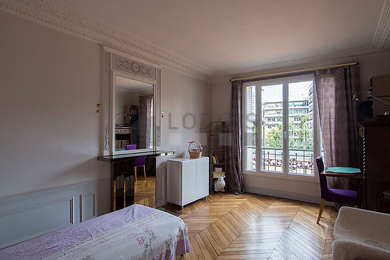 Bedroom with wooden floor