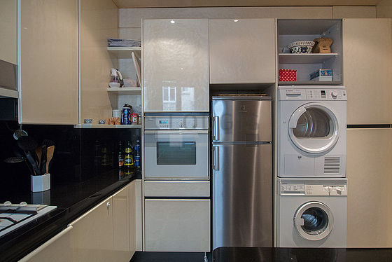 Bright kitchen with windows facing the courtyard