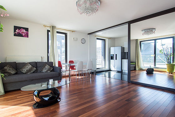 Living room with double-glazed windows facing the road