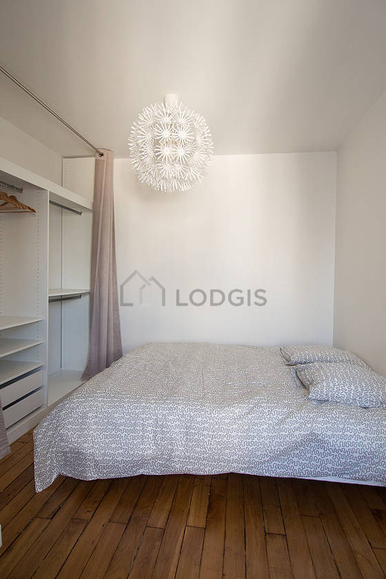 Bedroom with wooden floor