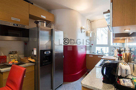 Kitchen where you can have dinner for 2 person(s) equipped with dishwasher, refrigerator, extractor hood, crockery