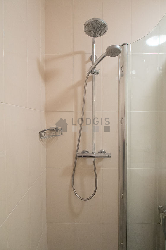 Bathroom equipped with washing machine, bath towels