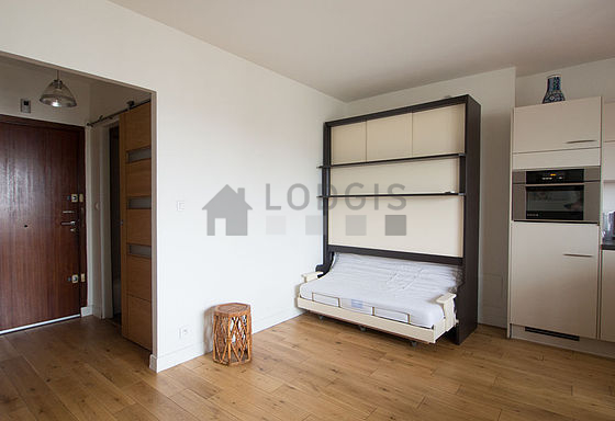 Living room with double-glazed windows and balcony facing the courtyard