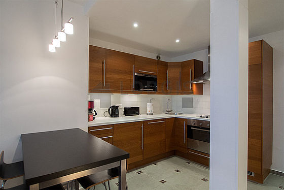 Kitchen where you can have dinner for 4 person(s) equipped with washing machine, dryer, refrigerator, extractor hood