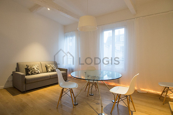 Very quiet living room furnished with 1 sofabed(s) of 140cm, dining table, wardrobe, cupboard