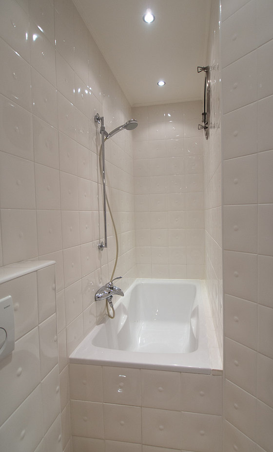 Pleasant bathroom with tile floor