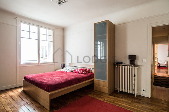 Bedroom with wooden floor