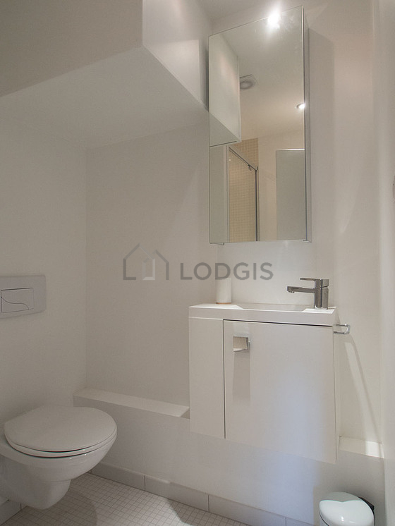 Pleasant and bright bathroom with tile floor