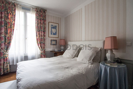 Bedroom with wooden floor