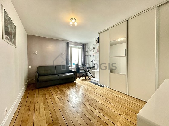 Quiet living room furnished with 1 sofabed(s) of 180cm, tv, fan, 1 armchair(s)