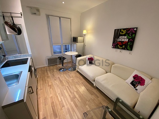 Very quiet living room furnished with 1 sofabed(s) of 140cm, dining table, coffee table, cupboard