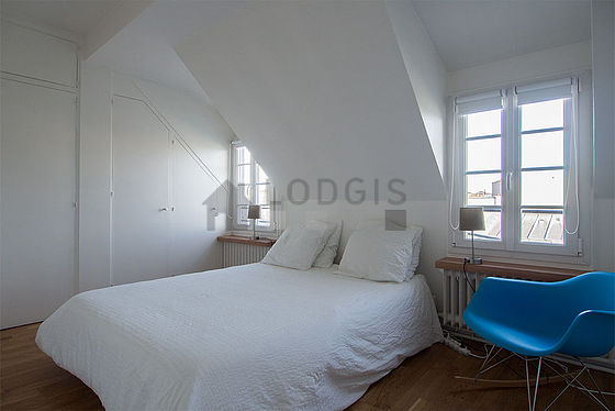 Bedroom with wooden floor