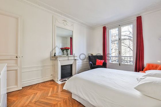 Bedroom with double-glazed windows facing the road